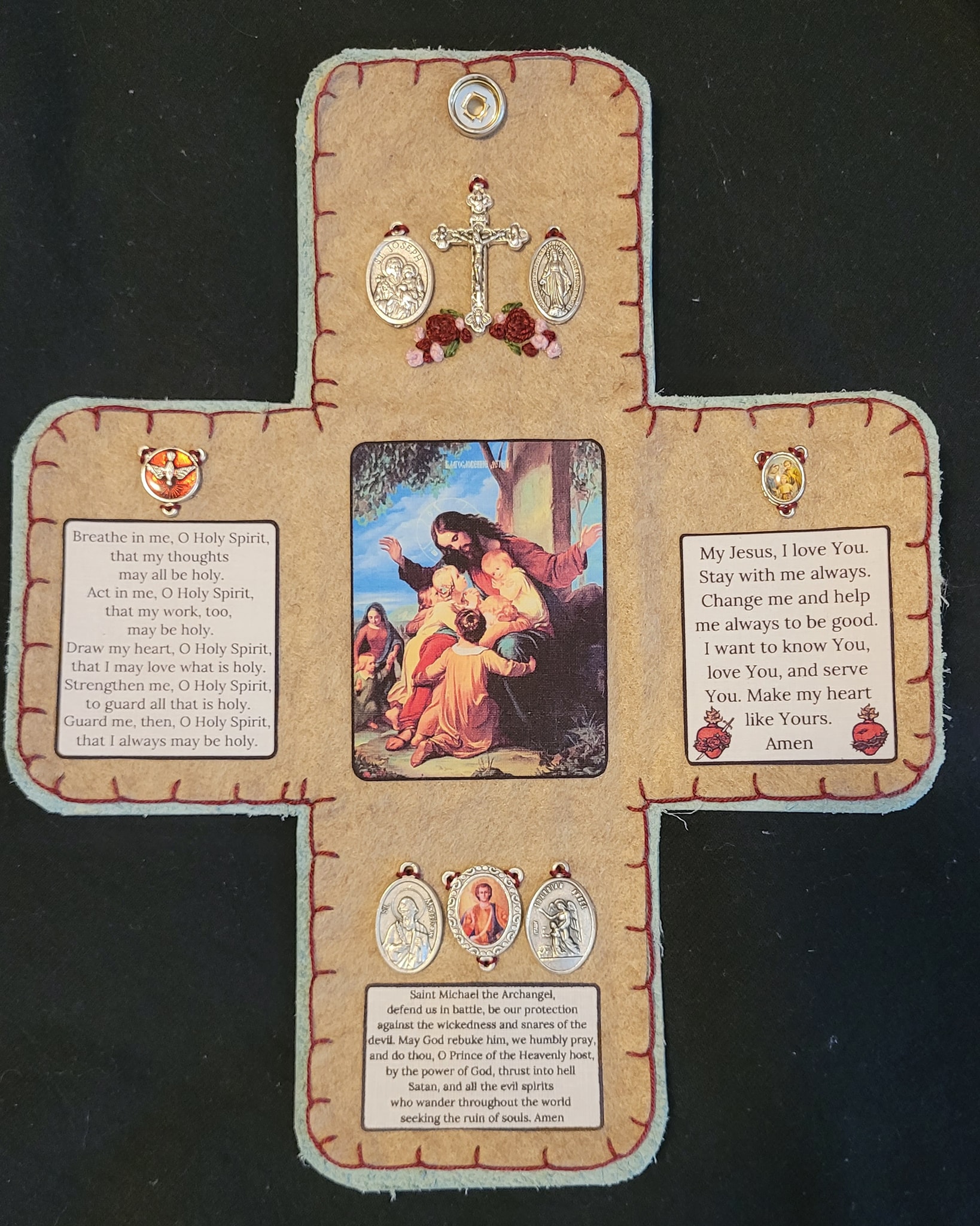 Open pocket oratory showing sacred art